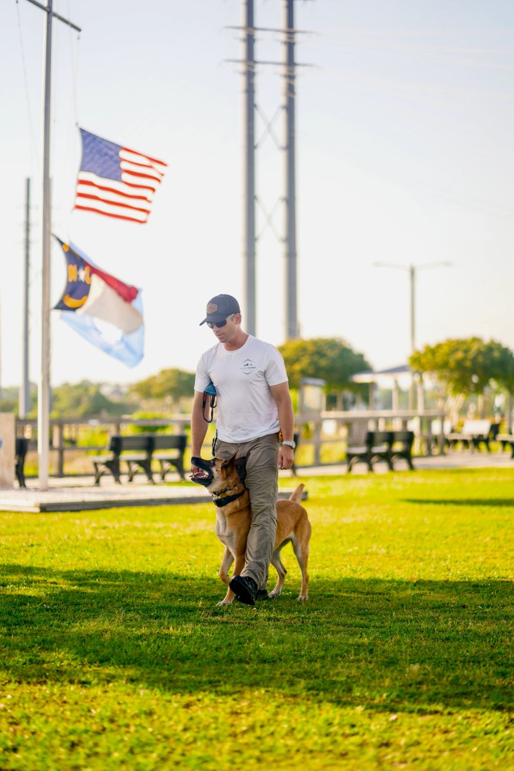 Trainer Ryan working with a dog outside